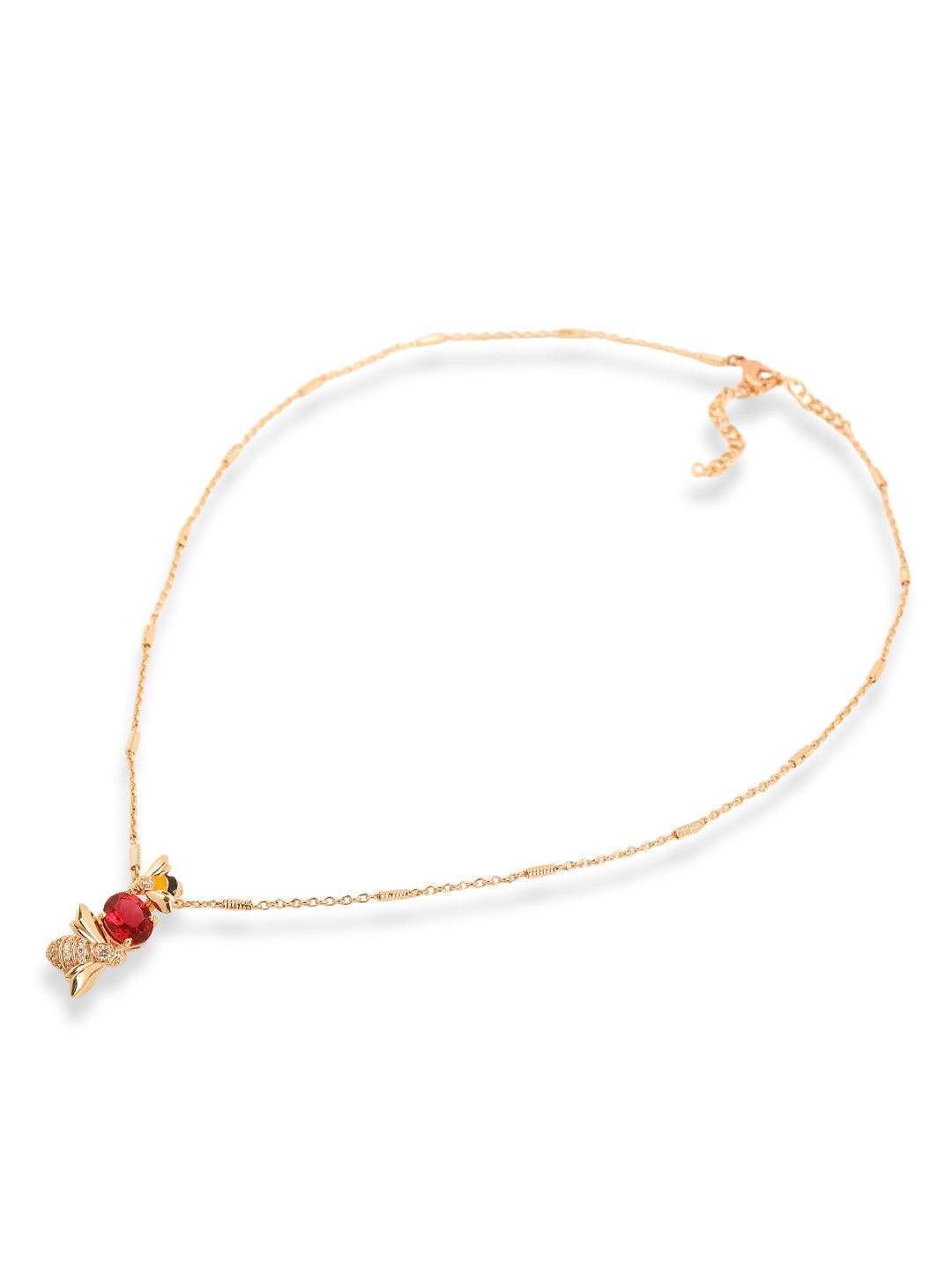 Gold necklace with a red pendant on a white background